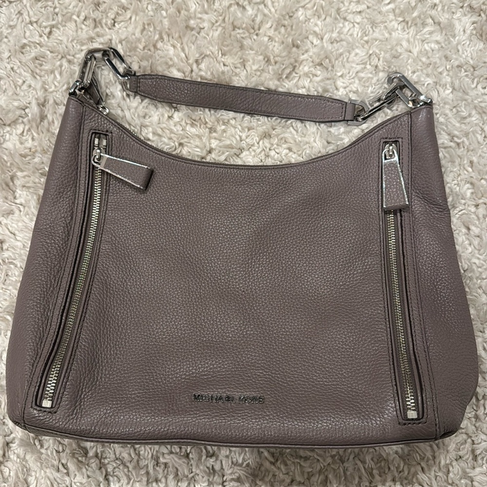 Micheal Kors hobo bag. Front zip